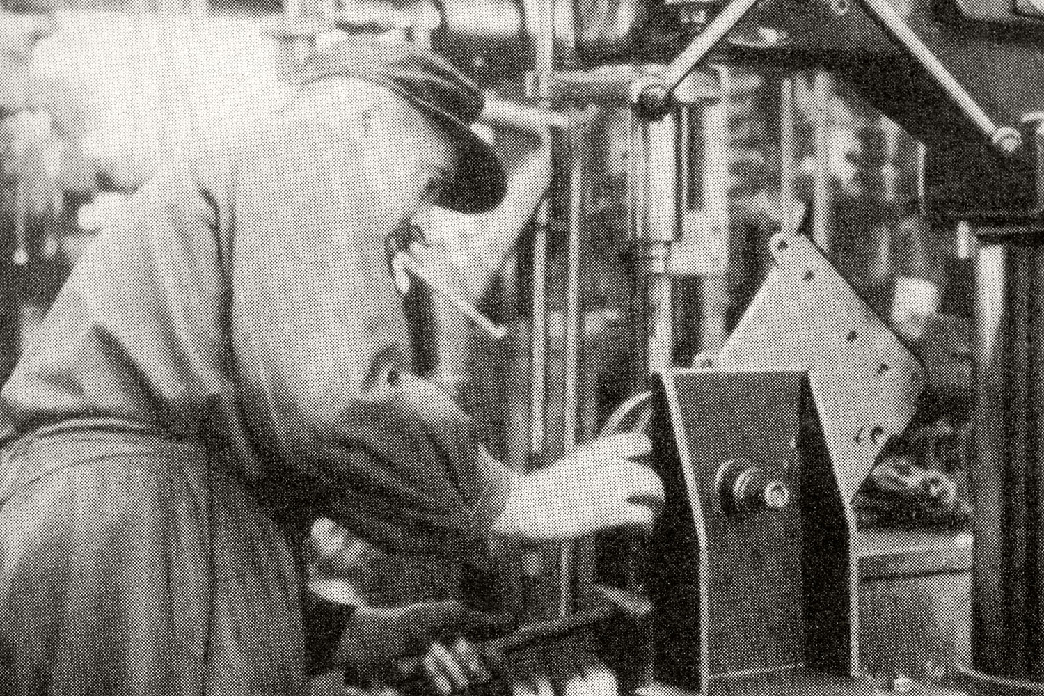 Men at work: With chipping machine parts on the drill machine.